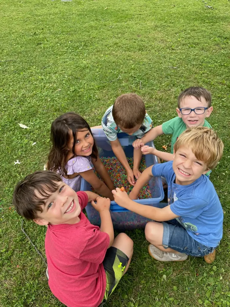 Campers caring for animals